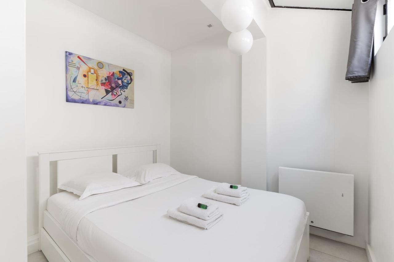Home Suite Home Gaité Montparnasse 4P Parigi Esterno foto